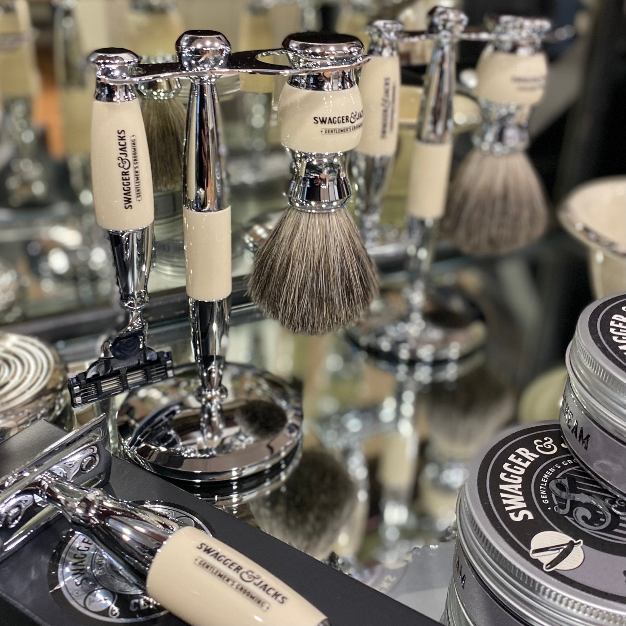 Chrome Mach3 razor and badger bristle shaving brush with display stand